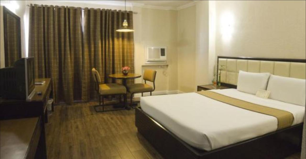 Rothman Hotel Манила Экстерьер фото